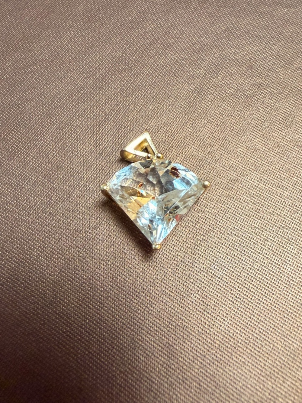 14k yellow gold with diamond stimulant charm
